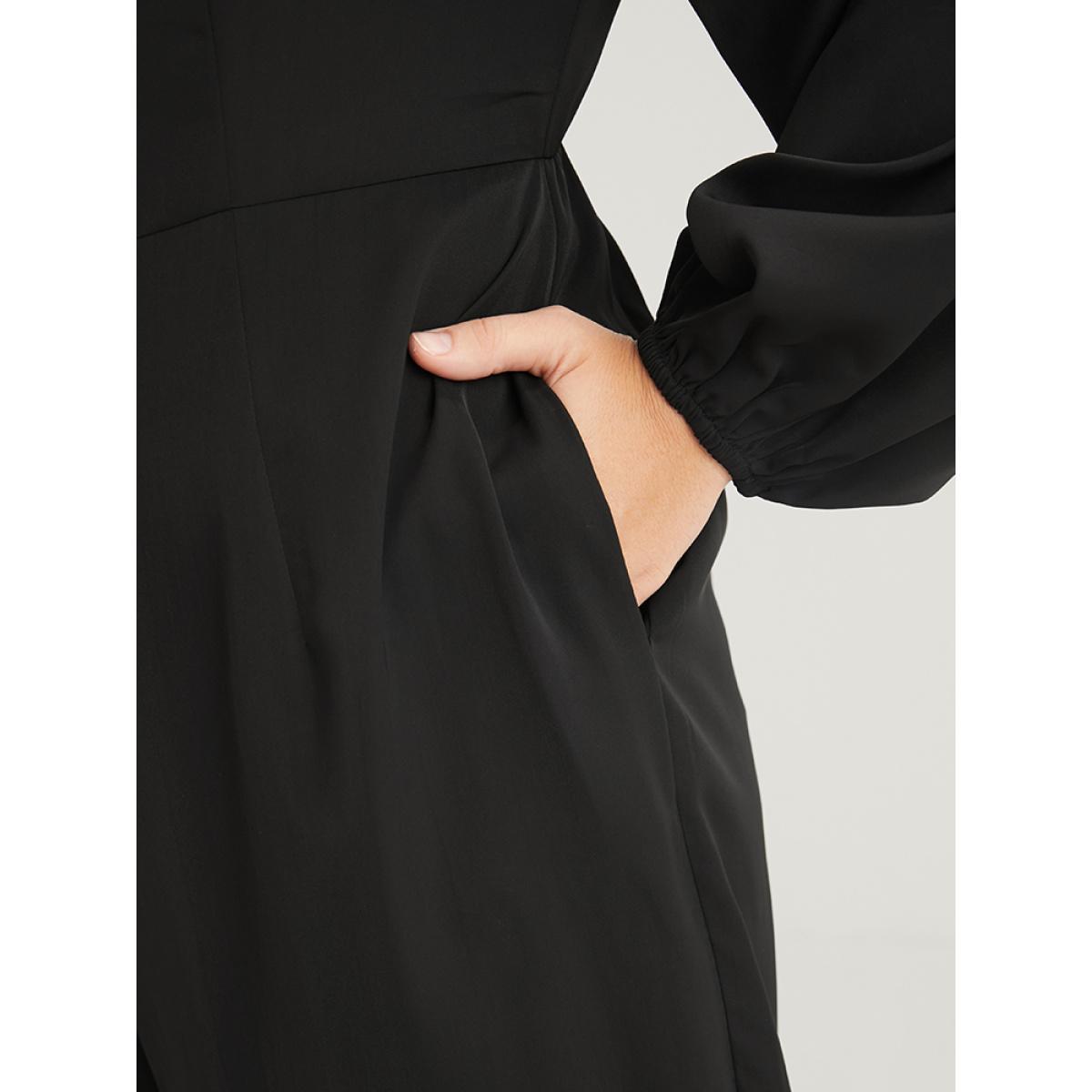 Plus Size Black Solid Button Front Lantern Sleeve Pocket Wide Leg Jumpsuit Women Office Long Sleeve V-neck Work Loose Jumpsuits BloomChic 26/4X Product Image