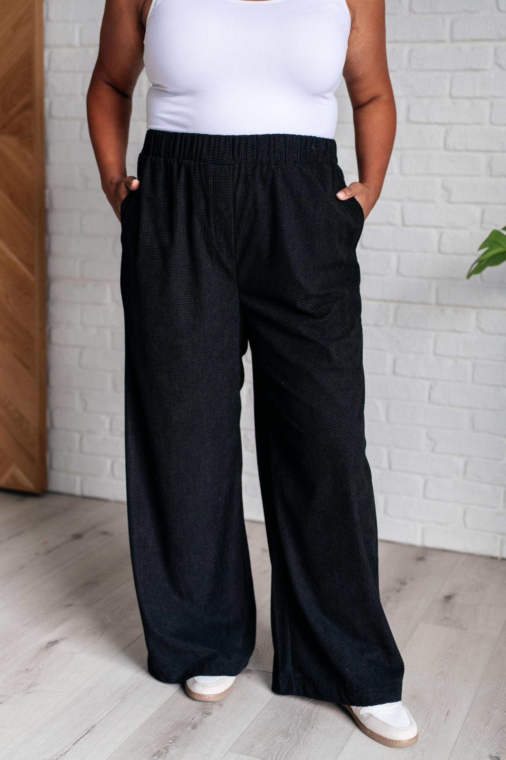 Just a Flirt Pleated Skirt in Black Product Image