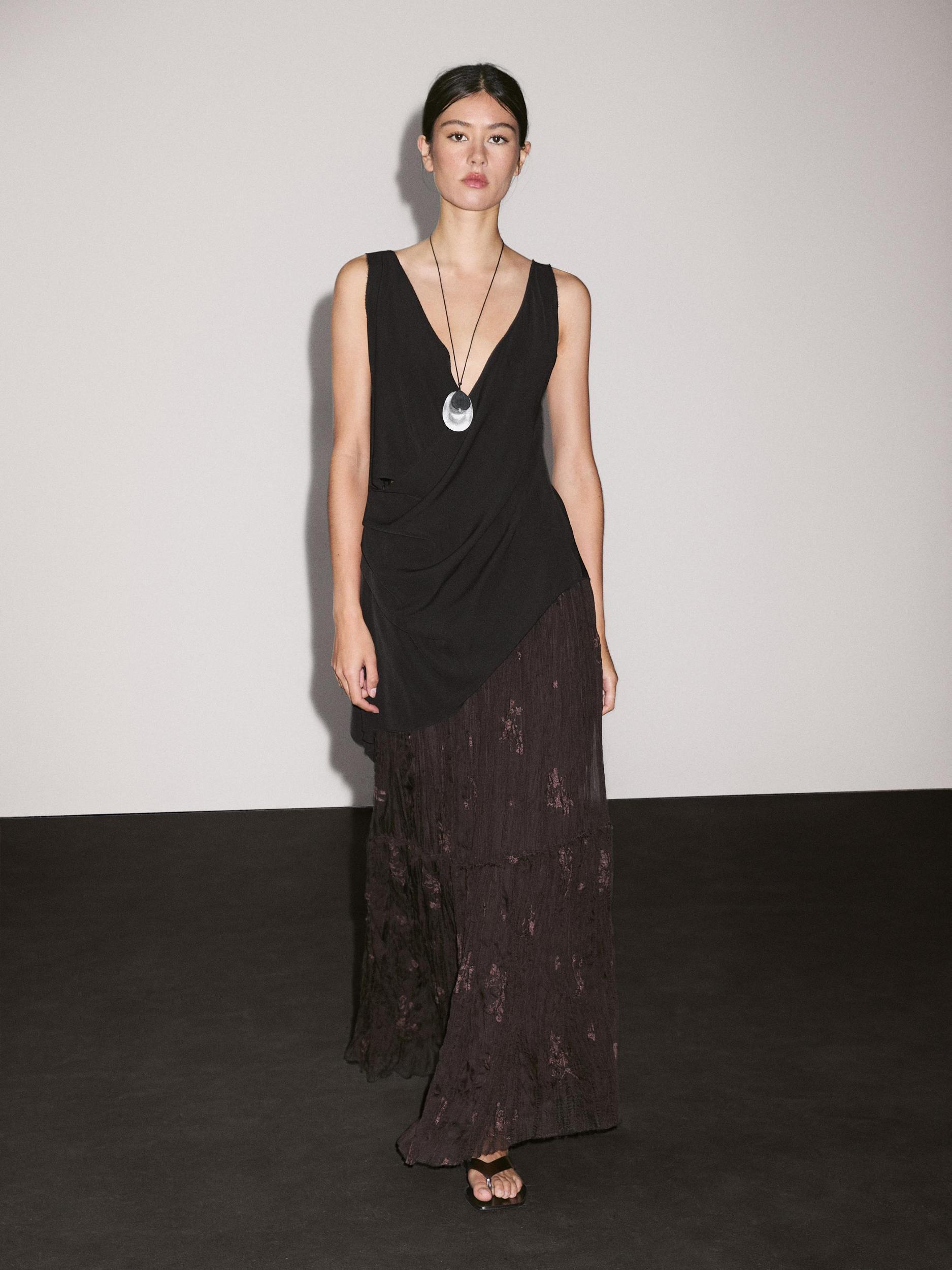 Long pleated skirt with embroidered detail Product Image