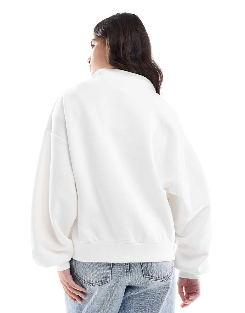 Stradivarius New York slogan quarter zip sweatshirt in ecru Product Image