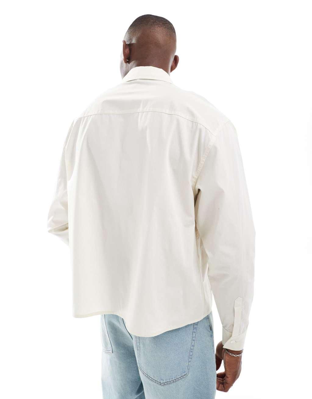 ASOS DESIGN oversized boxy shirt with large pockets in beige Product Image