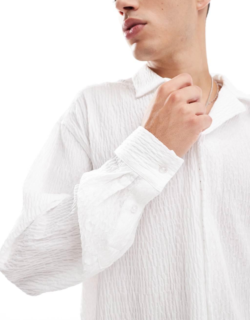 ASOS DESIGN oversized boxy seersucker shirt in beige Product Image