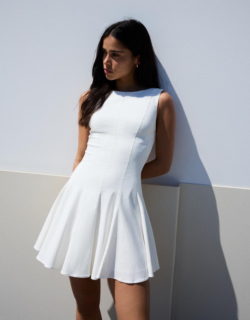 Stretch mini dress with flared skirt Product Image