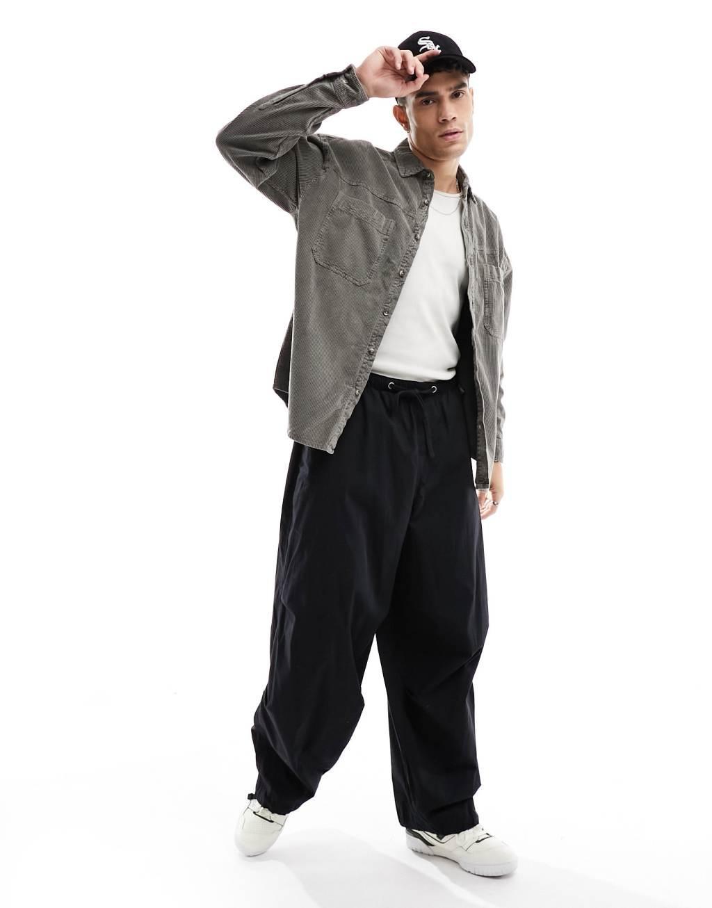 ASOS DESIGN 90s oversized snow wash cord shirt with frayed seams Product Image