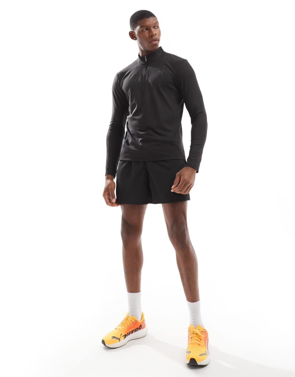 PUMA Training Slim Fit 1/4 Zip Sweater in black Product Image