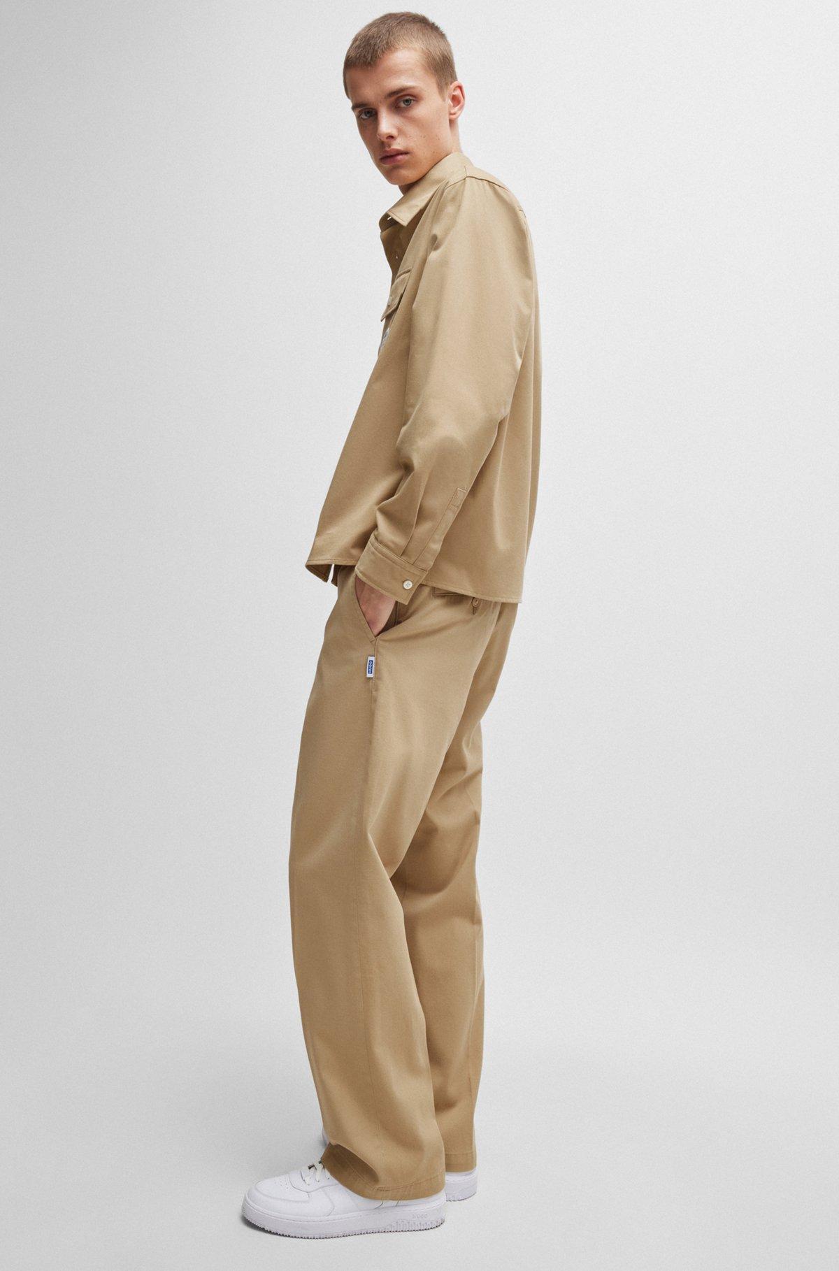 Baggy-fit trousers in cotton twill Product Image