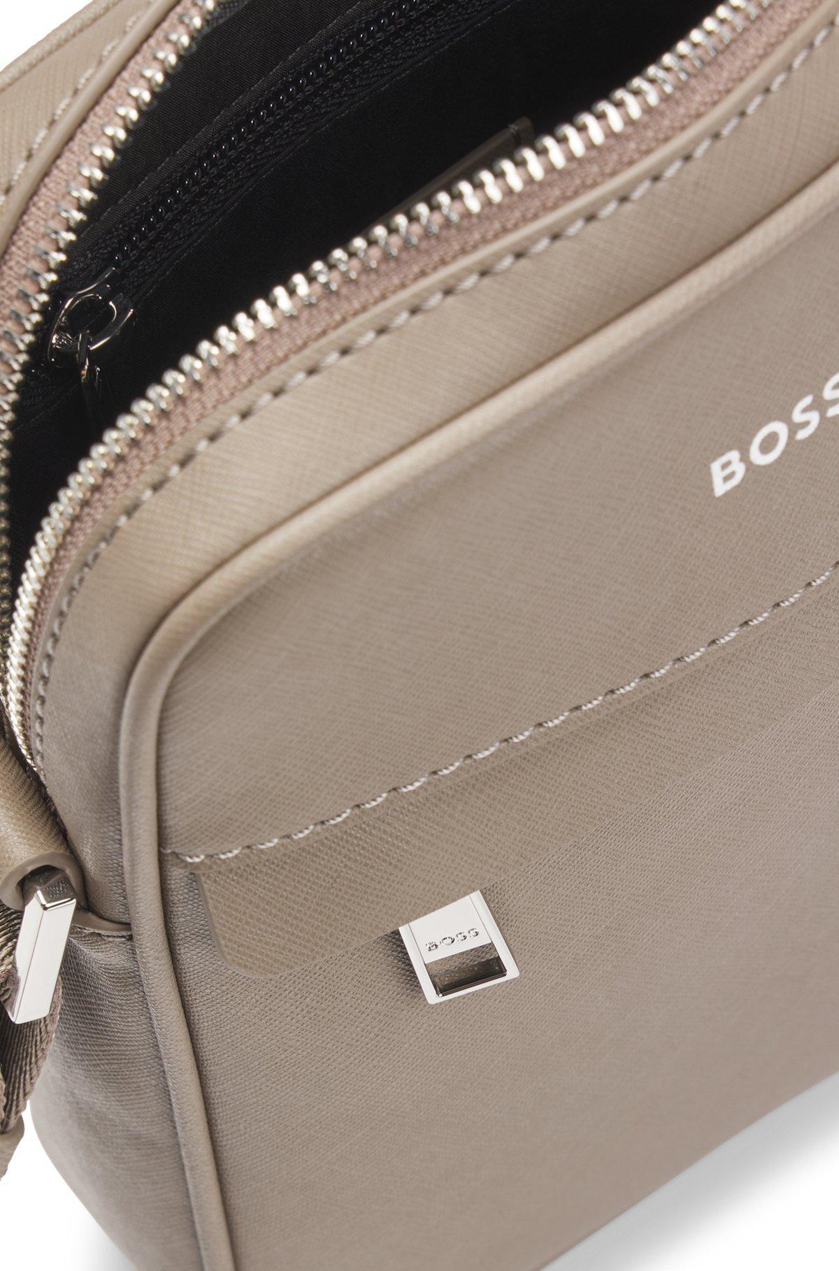 Reporter bag with signature stripe and logo detail Product Image