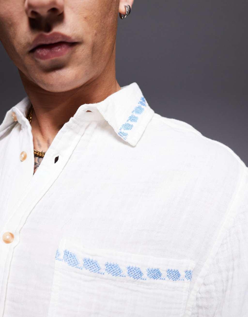 ASOS DESIGN relaxed textured shirt with cross stitch embroidery in white   Product Image