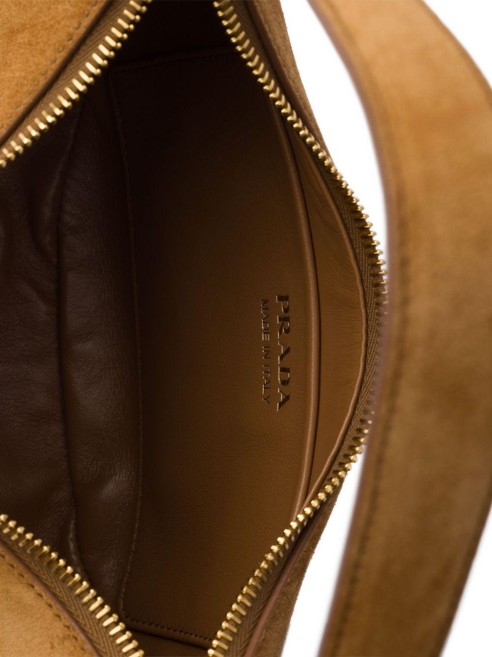 Arqué suede shoulder bag Product Image