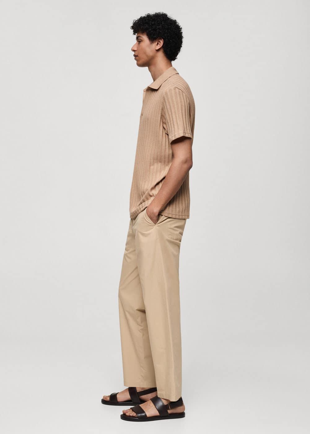 Regular-fit ribbed cotton polo shirt - Men | MANGO USA Product Image
