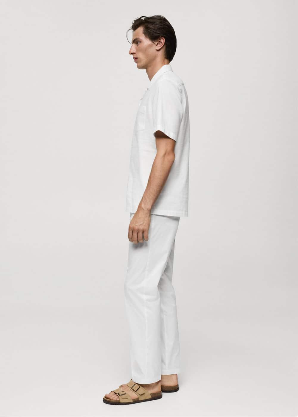 Regular-fit 100% seersucker cotton shirt - Men | MANGO USA Product Image