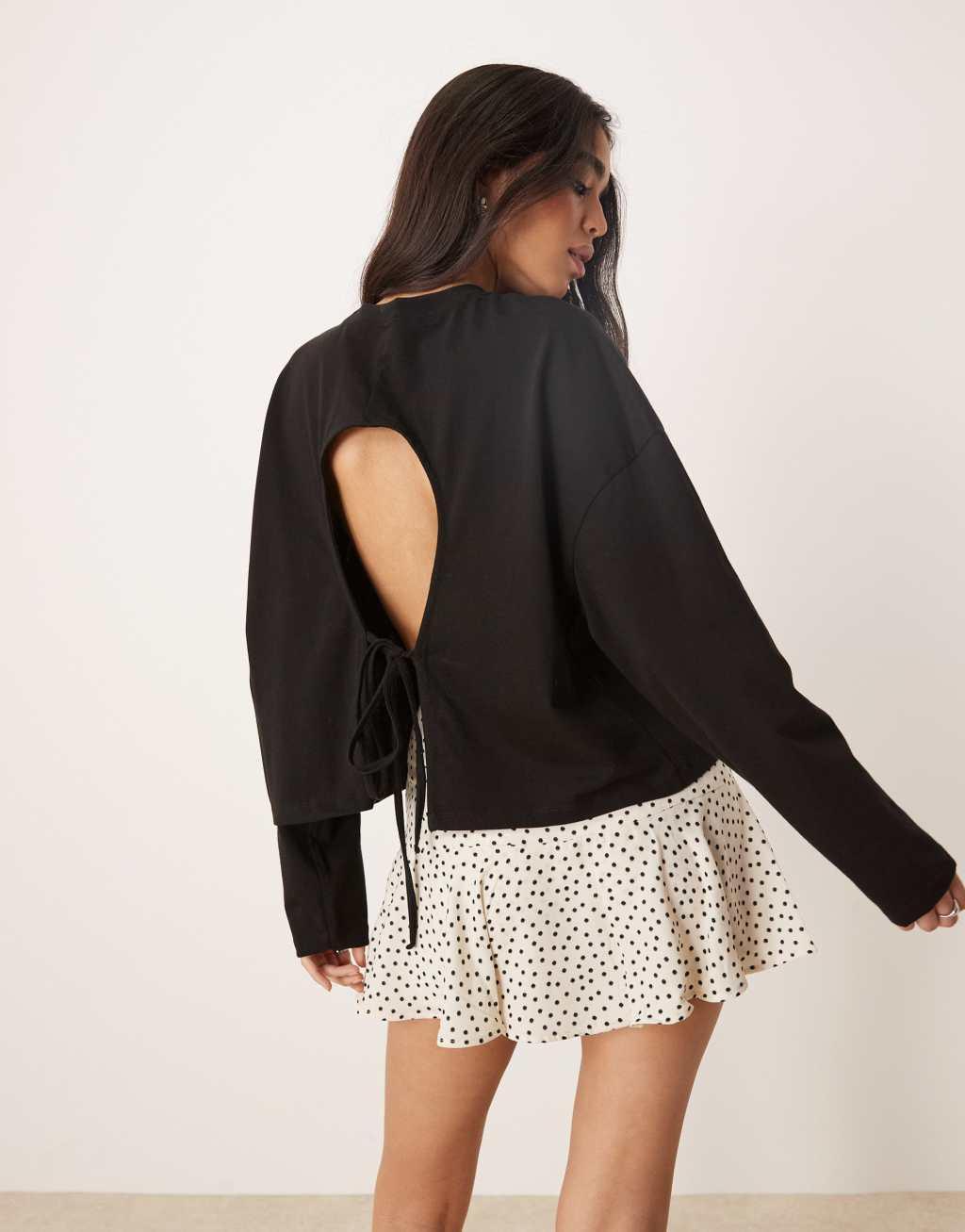 ASOS DESIGN long sleeve tee with tie back top in black Product Image