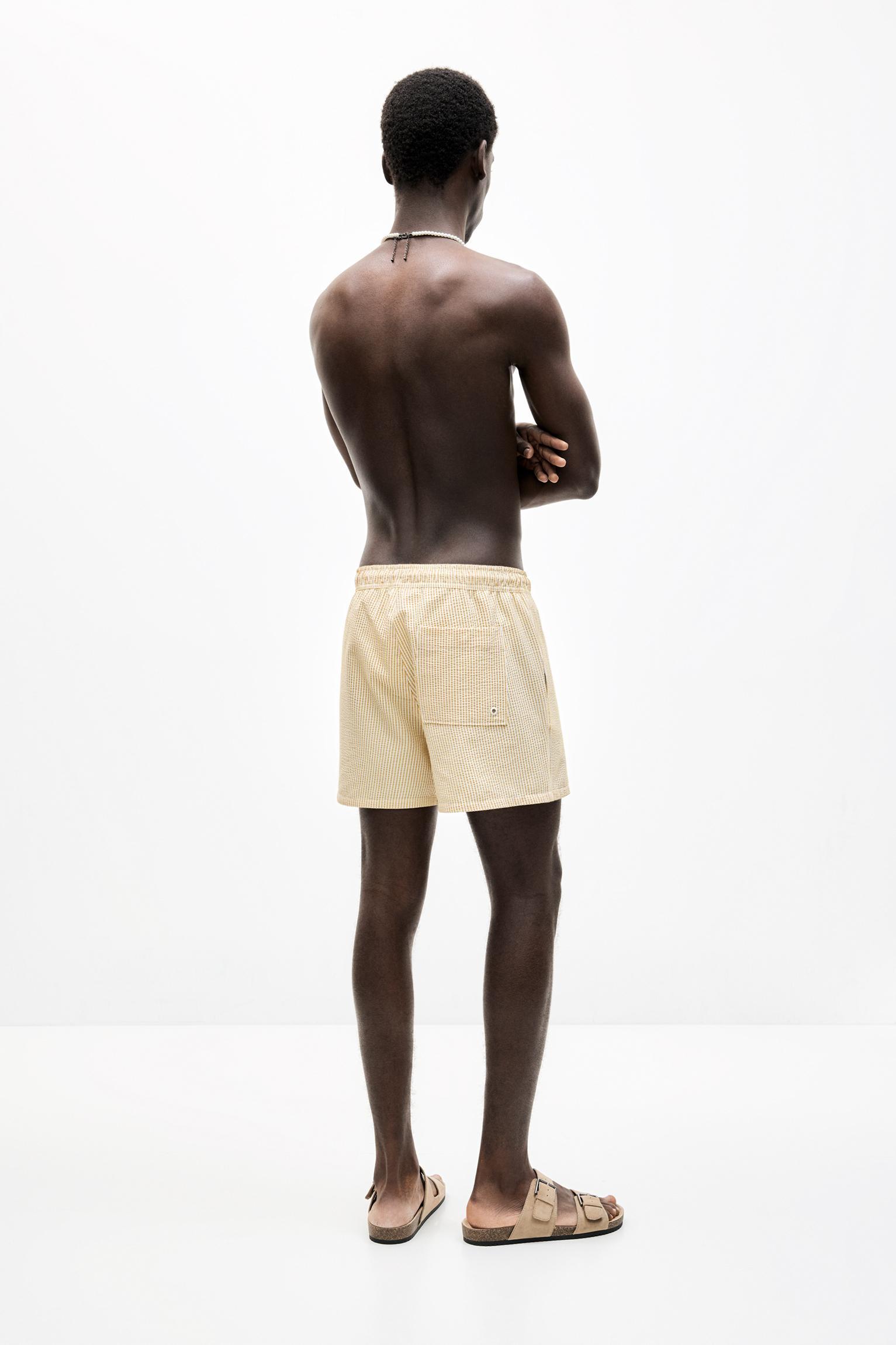 Striped seersucker swimming trunks Product Image