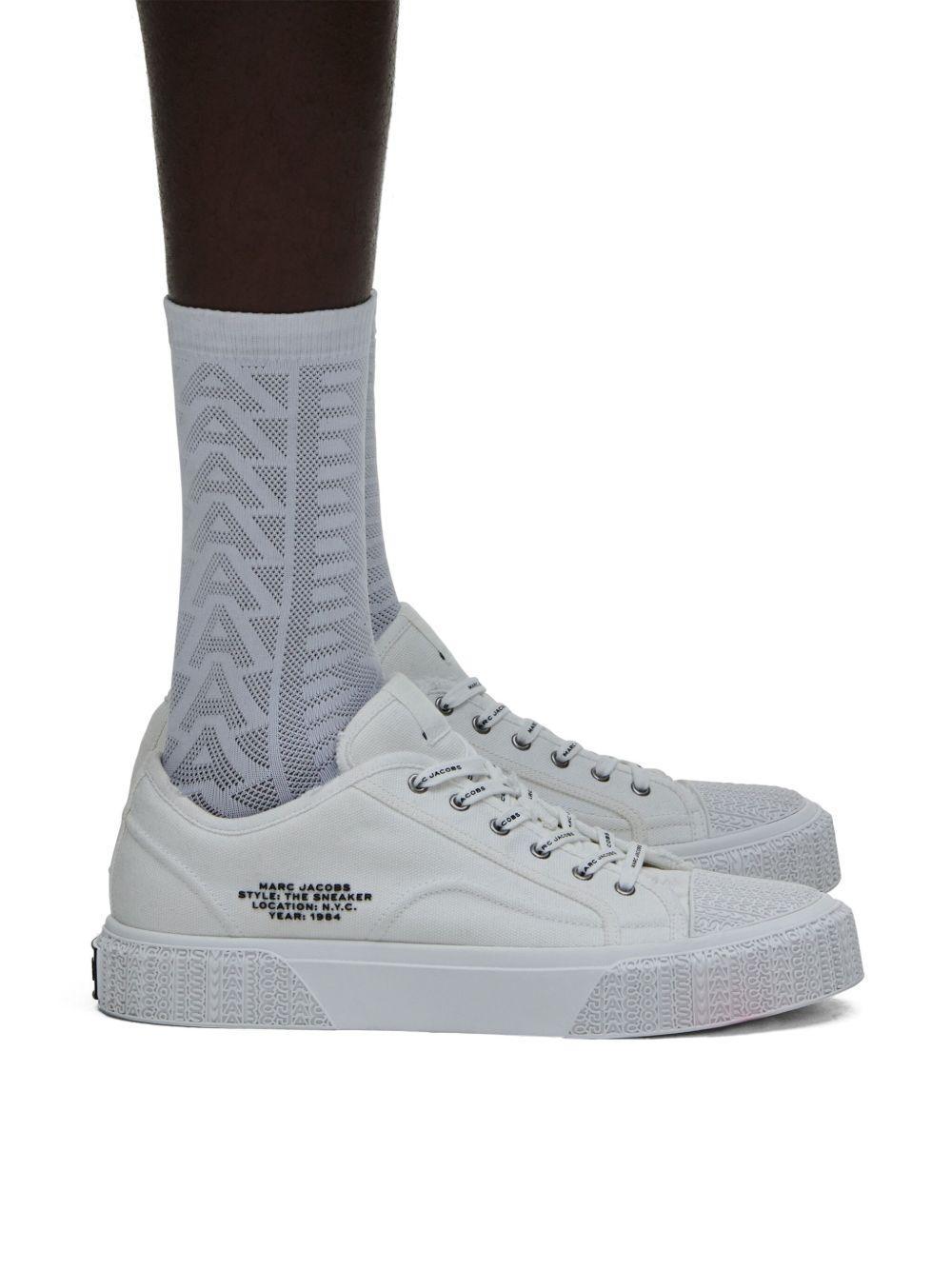 distressed canvas sneakers Product Image