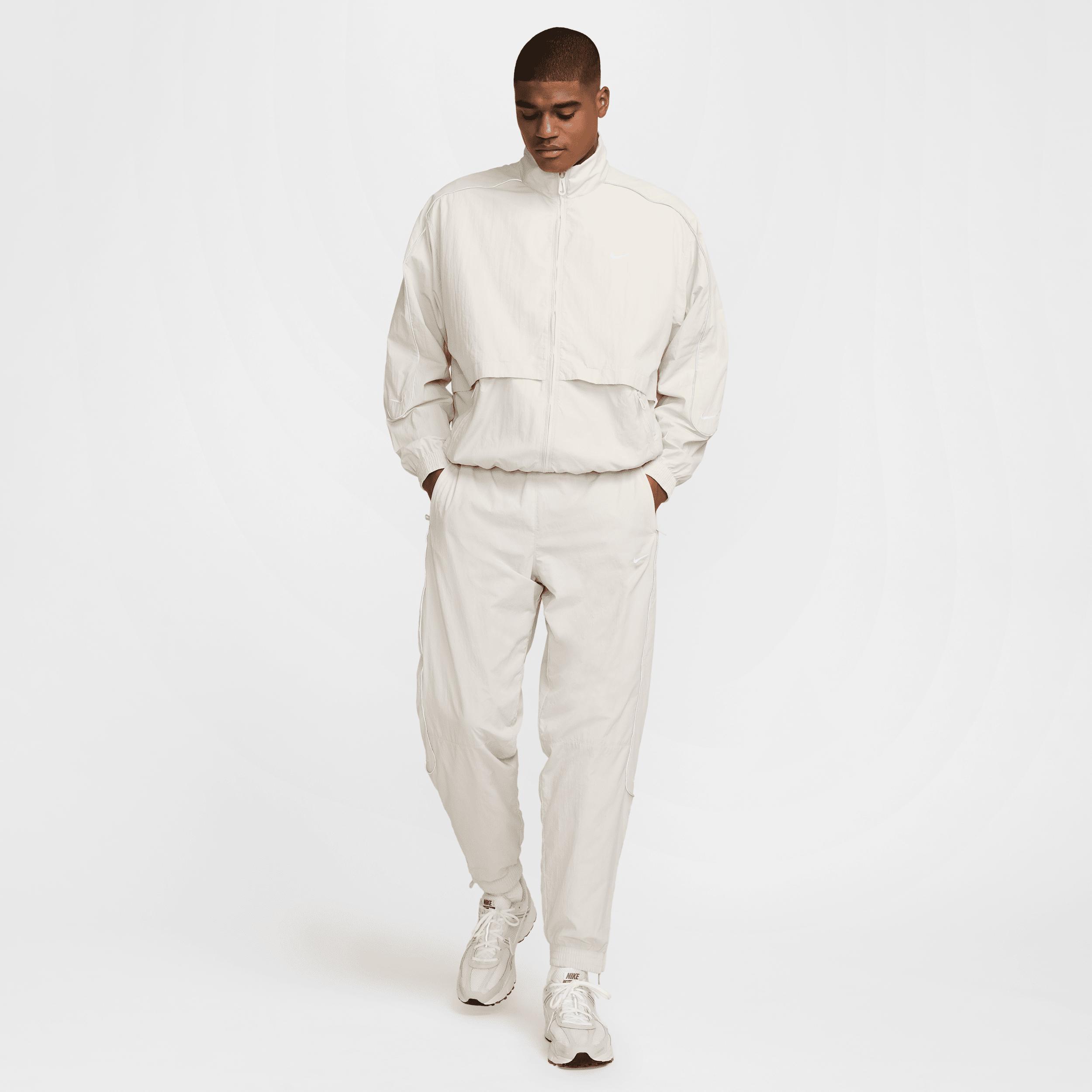 Men's Nike Sportswear Solo Swoosh Woven Track Jacket Product Image