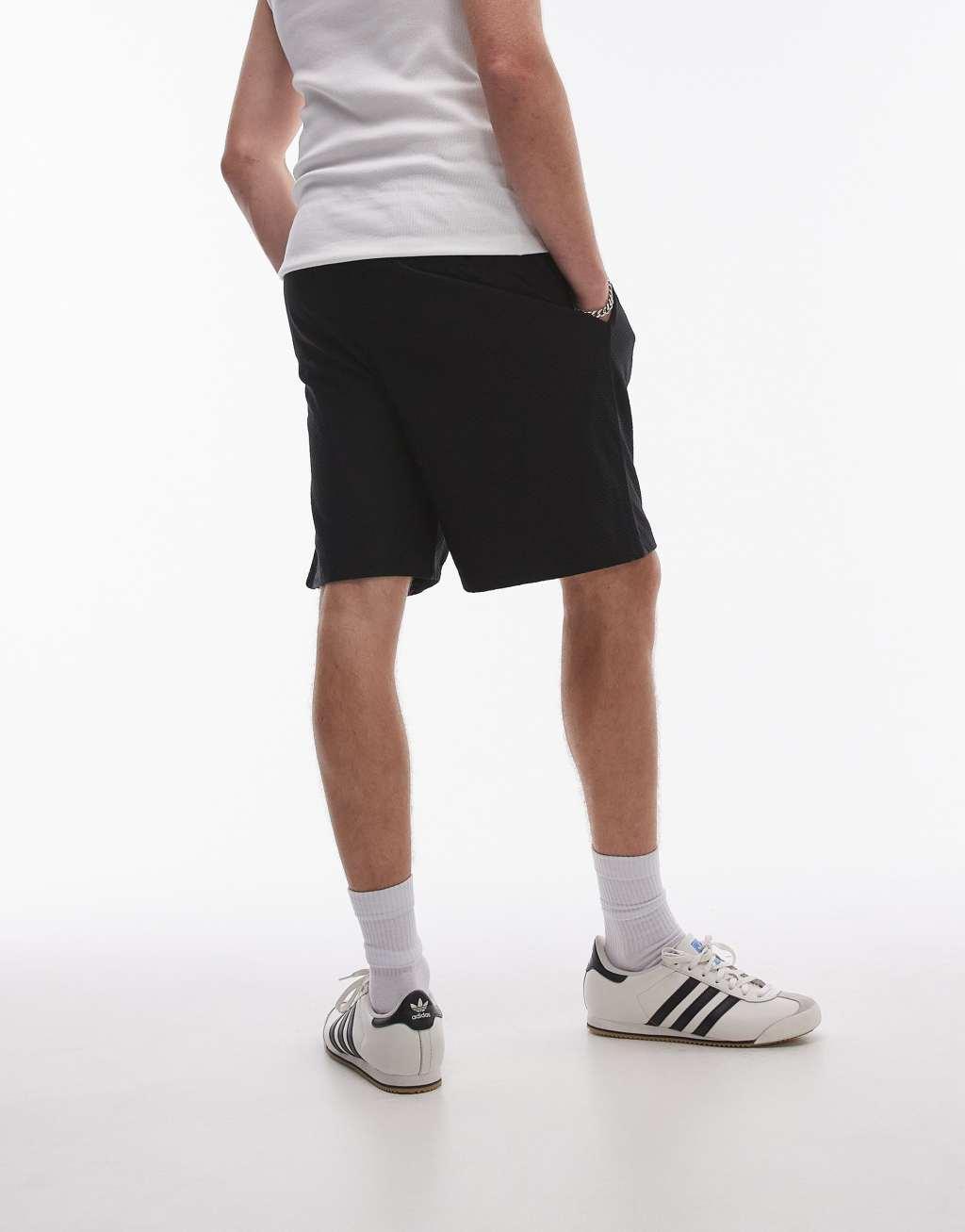 Topman oversized fit airtex shorts in black Product Image