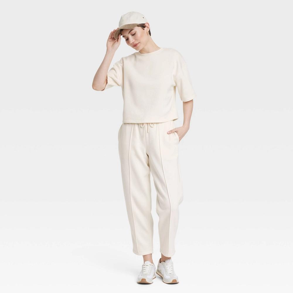 Womens Leisure Studio Mid-Rise Barrel Leg Sweatpants - Universal Thread Cream XS: Elastic Waistband Product Image