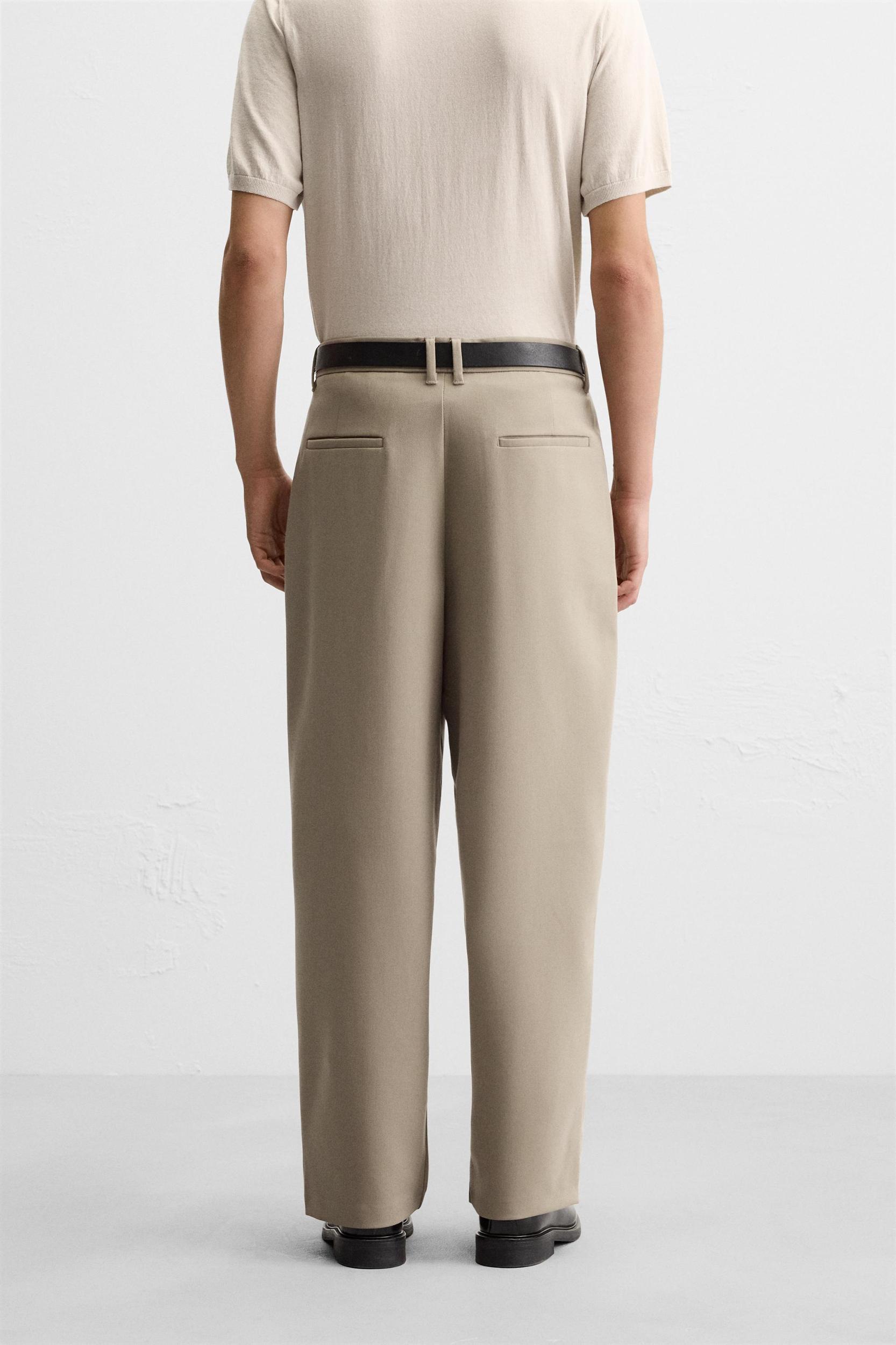 RELAXED FIT PLEATED PANTS Product Image