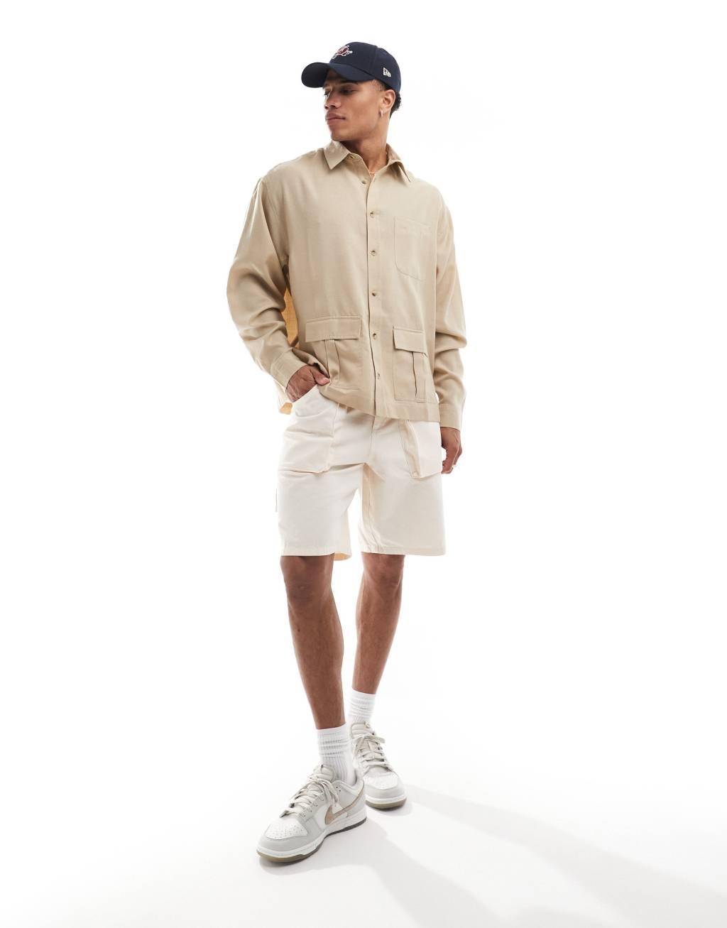 ASOS DESIGN oversized square collar shirt with cargo pockets in beige Product Image