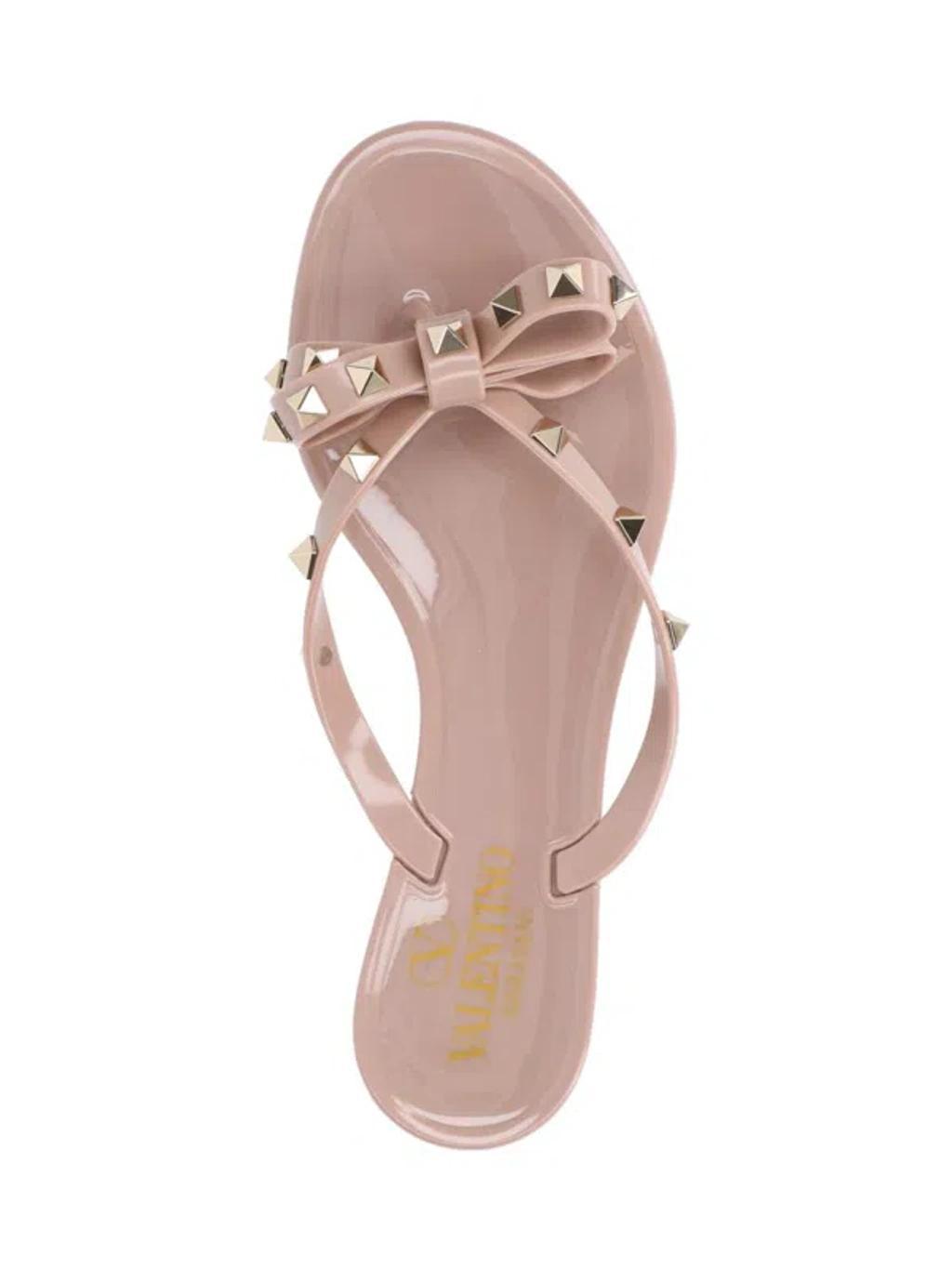 VALENTINO GARAVANI Women Rockstud Rubber Flip Flops In Beige Product Image