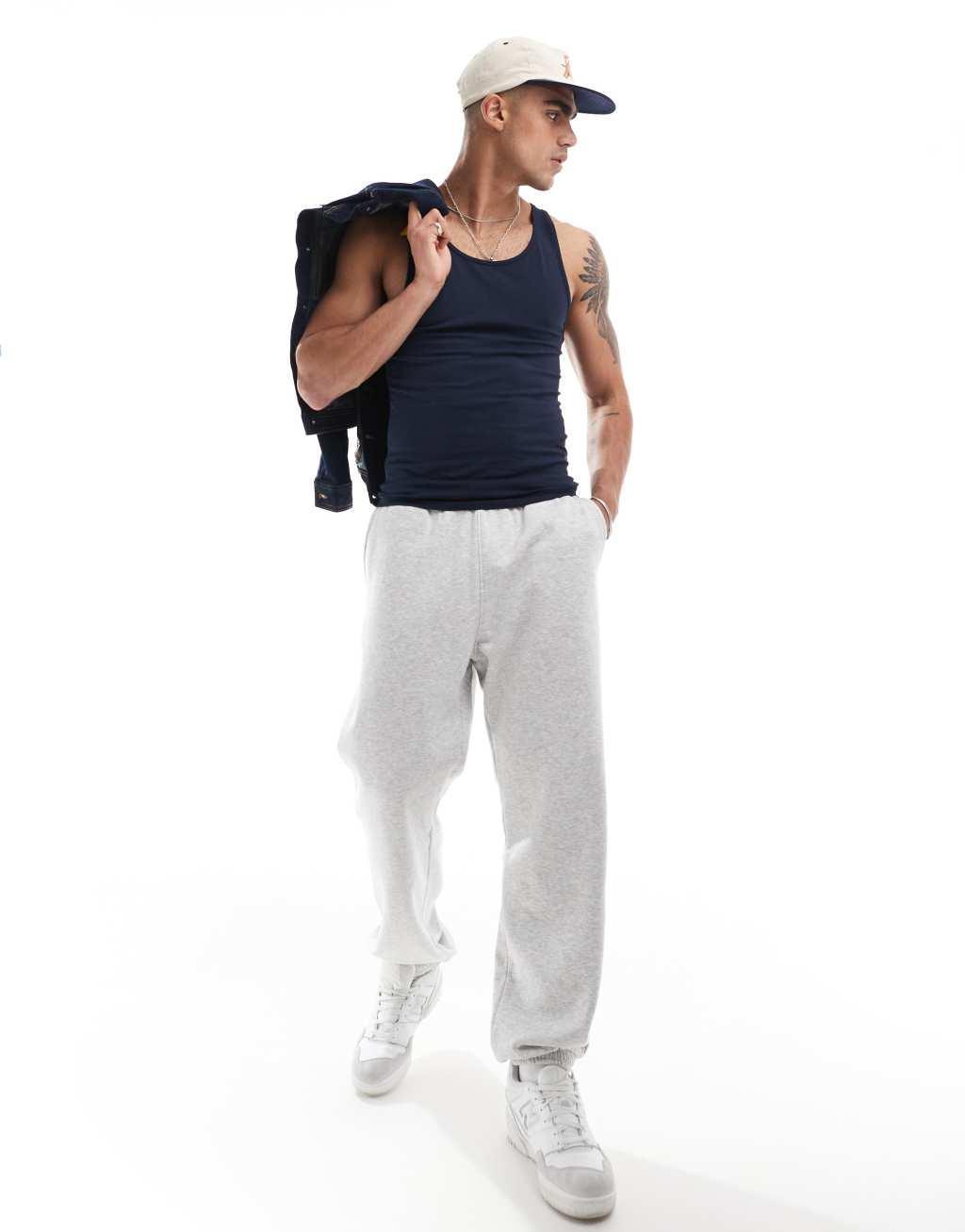 ASOS DESIGN muscle fit tank top in navy Product Image