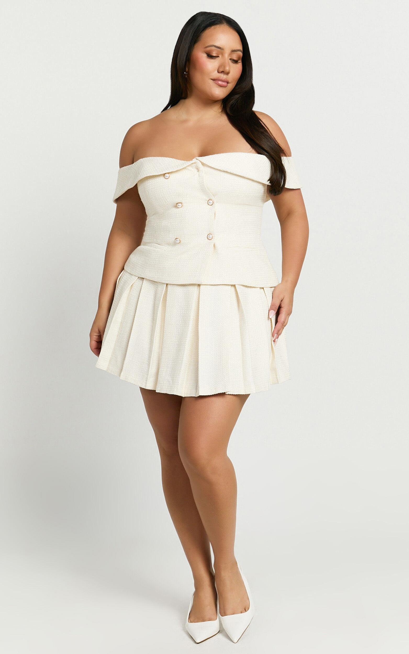 Maggie Mini Skirt - Pleated Mid Rise Boucle Skirt in Cream Product Image