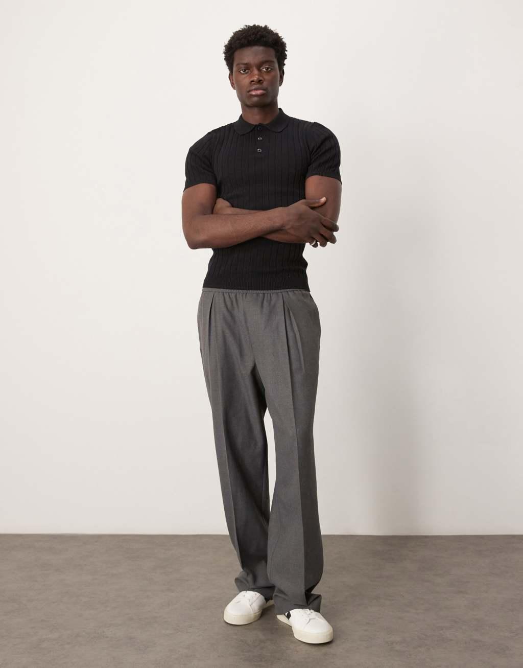 ASOS DESIGN knitted muscle fit rib polo t-shirt in black Product Image