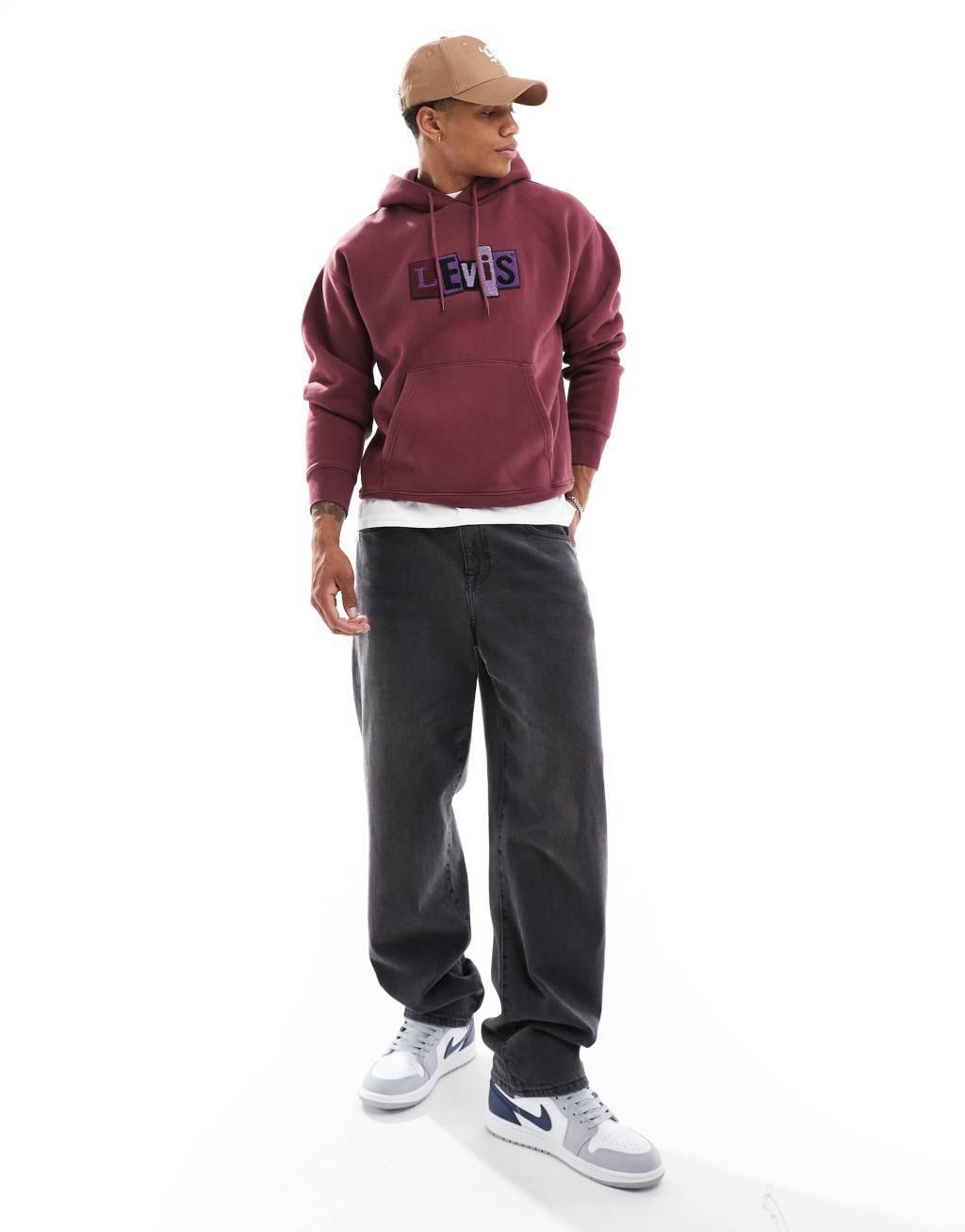 Levi's Skateboarding chenille patch logo relaxed fit hoodie in burgundy Product Image