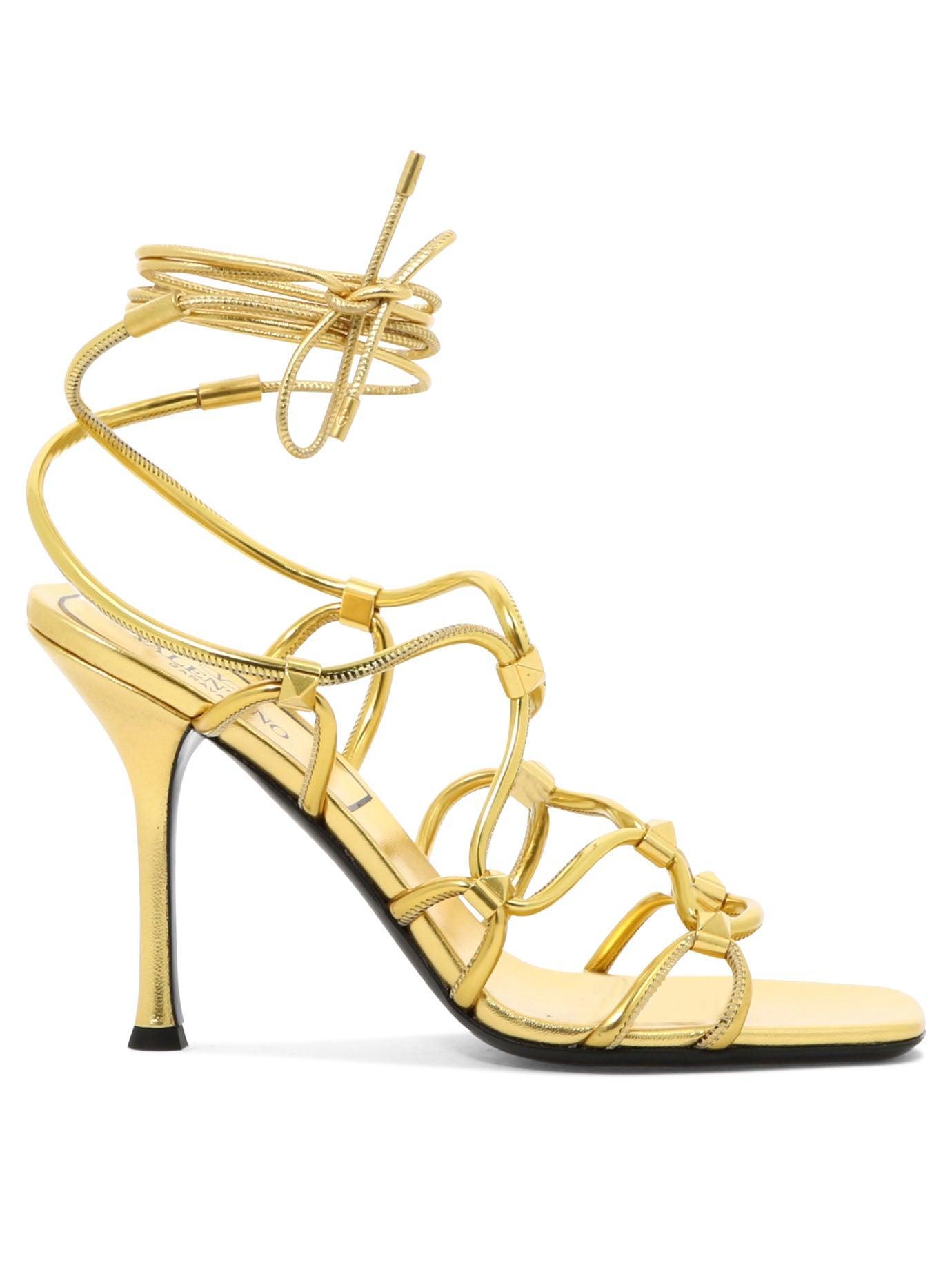 VALENTINO GARAVANI Rockstud Net Heel Sandals In Antique Brass Product Image