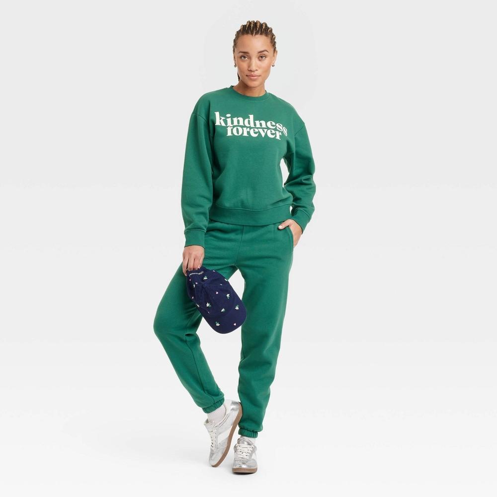 Women's Leisure Studio Graphic Pullover Sweatshirt - Universal Thread™ Green Product Image