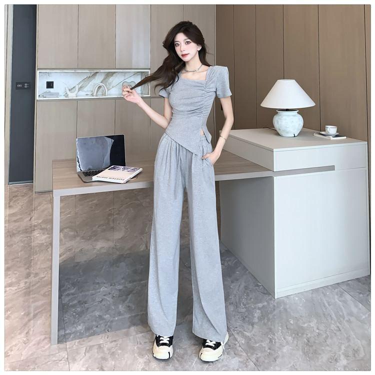 Set: Short-Sleeve Asymmetrical Neck Ruched Slit Slim Fit T-Shirt + Drawstring Waist Loose Fit Sweatpants Product Image