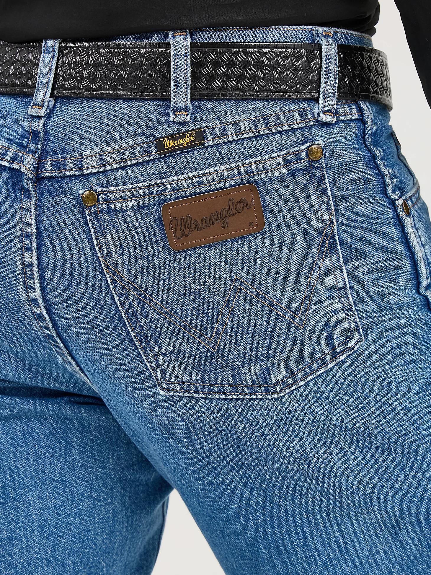 Premium Performance Cowboy Cut® Regular Fit Jean | Men's JEANS | Wrangler® Product Image