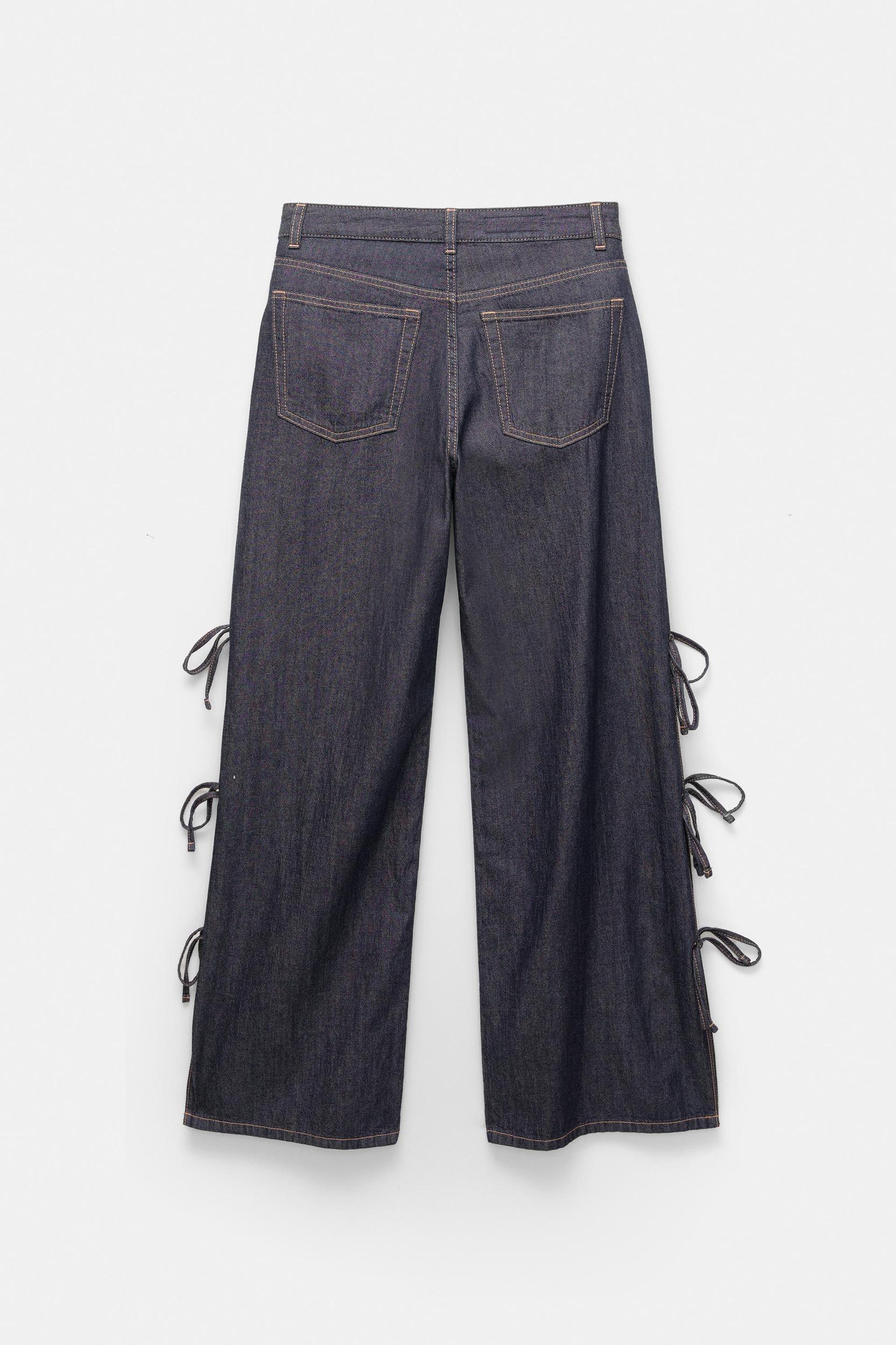 Wide-leg jeans with bows Product Image