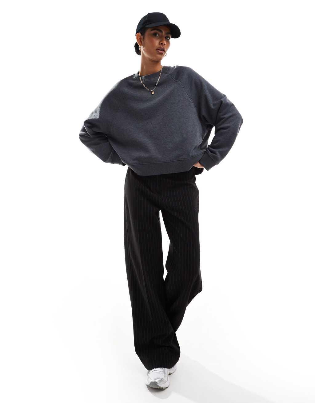 ASOS DESIGN oversized sweat with raglan detail in black Product Image