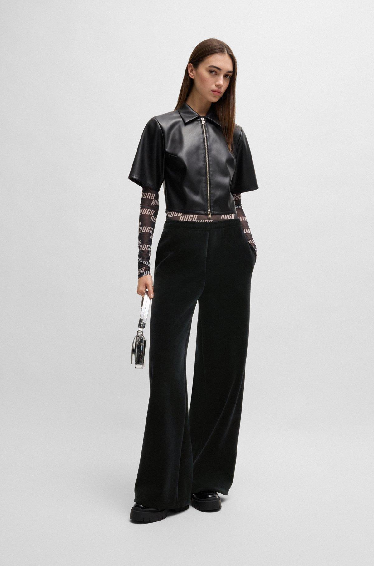 Relaxed-fit tracksuit bottoms in stretch velour Product Image