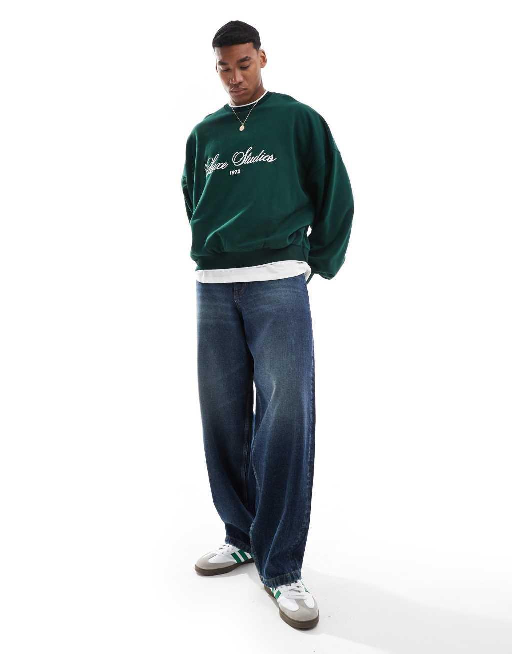 ASOS DESIGN extreme oversized crew neck sweatshirt with text print in dark green Product Image