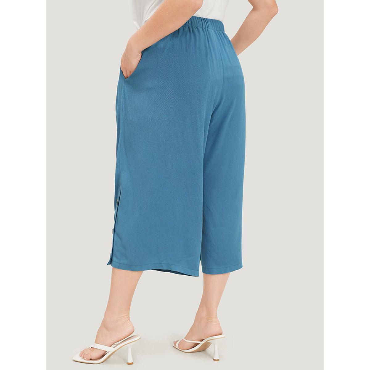 Plus Size Solid Button Gathered Pocket Loose Cropped Pants Women Cerulean Elegant Straight Leg High Rise Dailywear Pants BloomChic 12/L Product Image