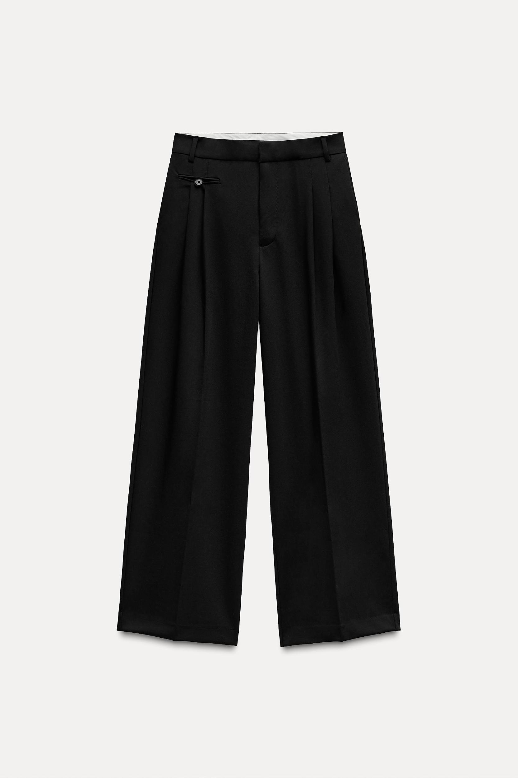 PLEATED PANTS WITH POCKETS Product Image