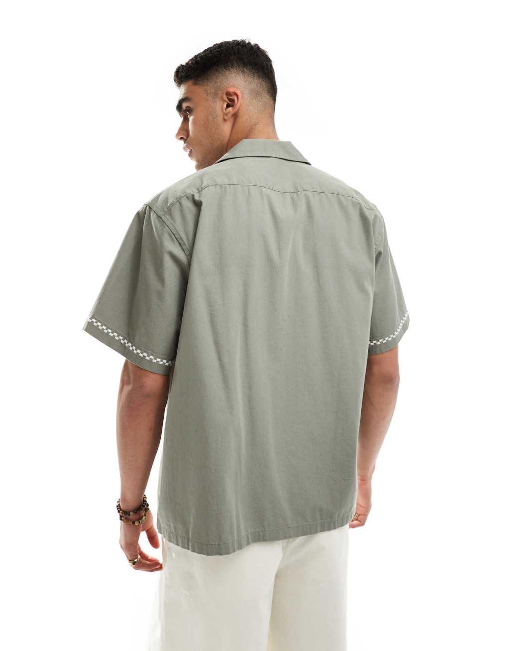 Selected Homme revere collar shirt with cream floral print in olive green Product Image