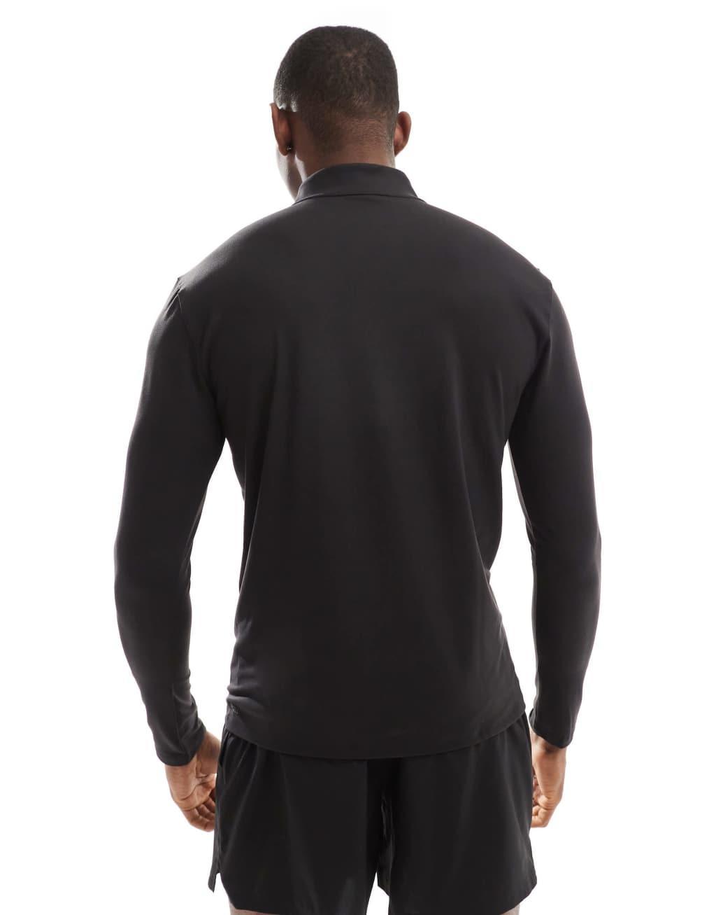 PUMA Training Slim Fit 1/4 Zip Sweater in black Product Image