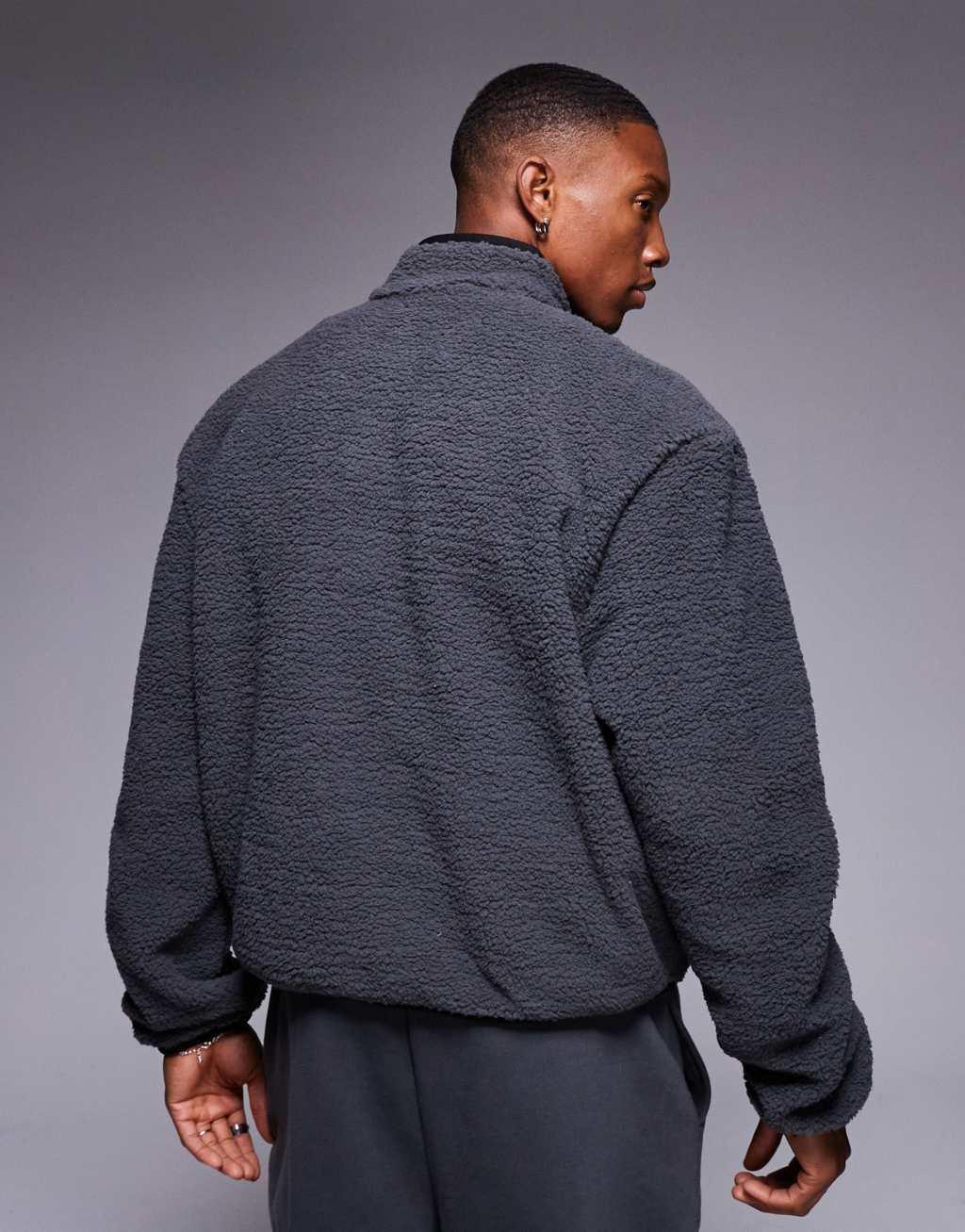 ASOS DESIGN boxy oversized quarter zip borg sweatshirt in washed black Product Image