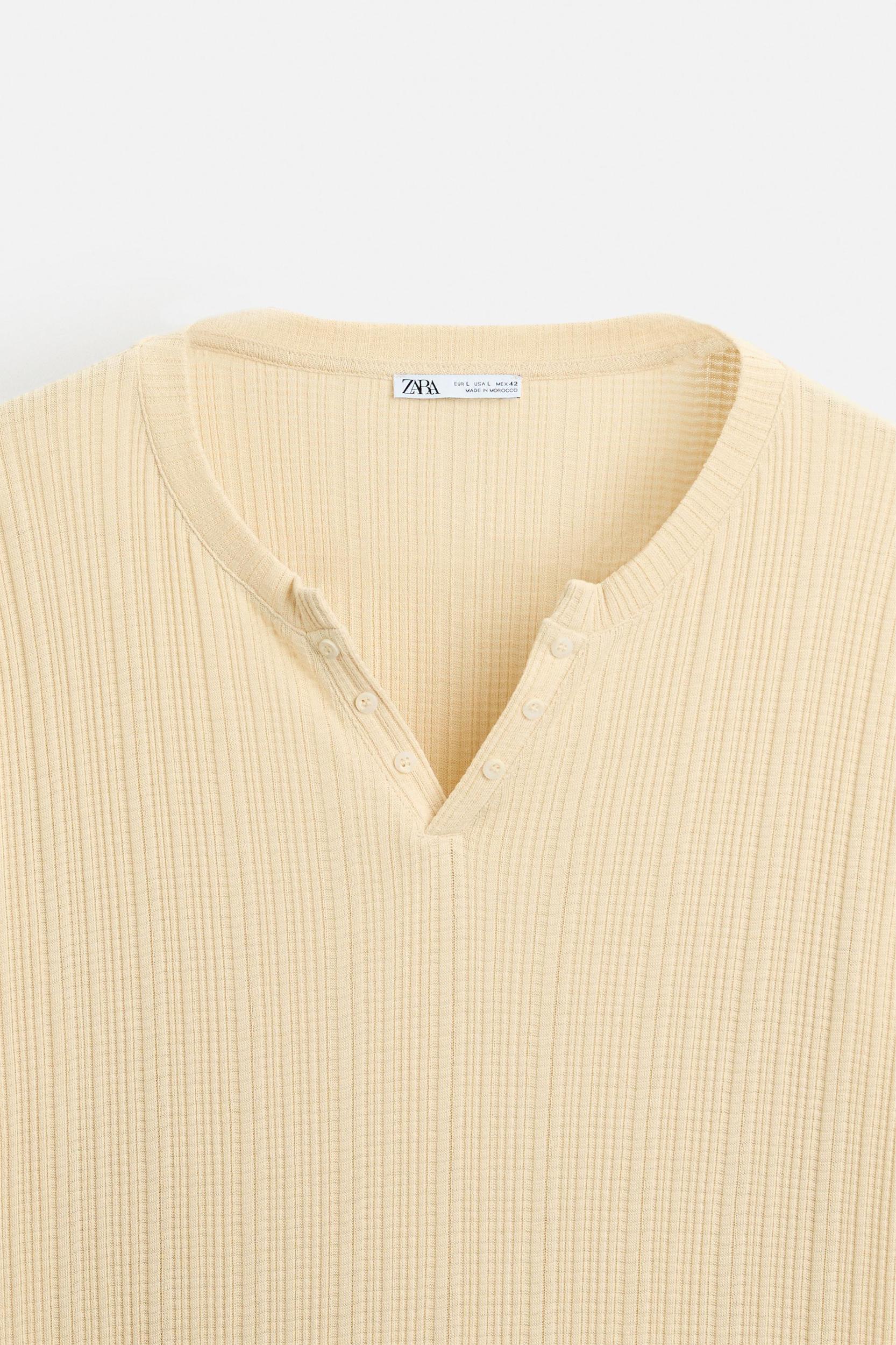 PLEATED BUTTON NECKLINE T-SHIRT Product Image