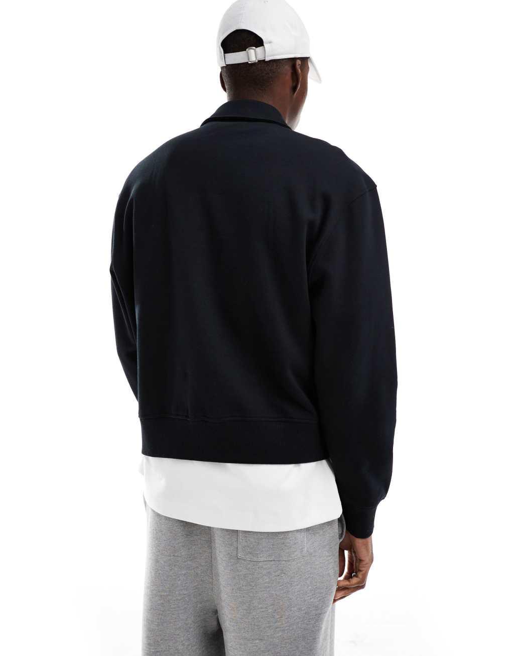 ASOS DESIGN oversized boxy quarter zip sweatshirt in black Product Image