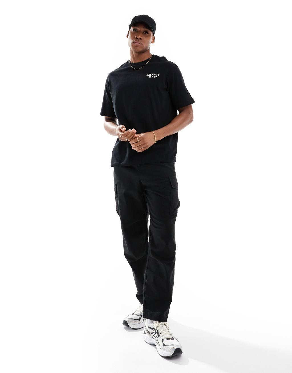 Selected Homme oversized T-shirt with balance palm placement back print in black Product Image