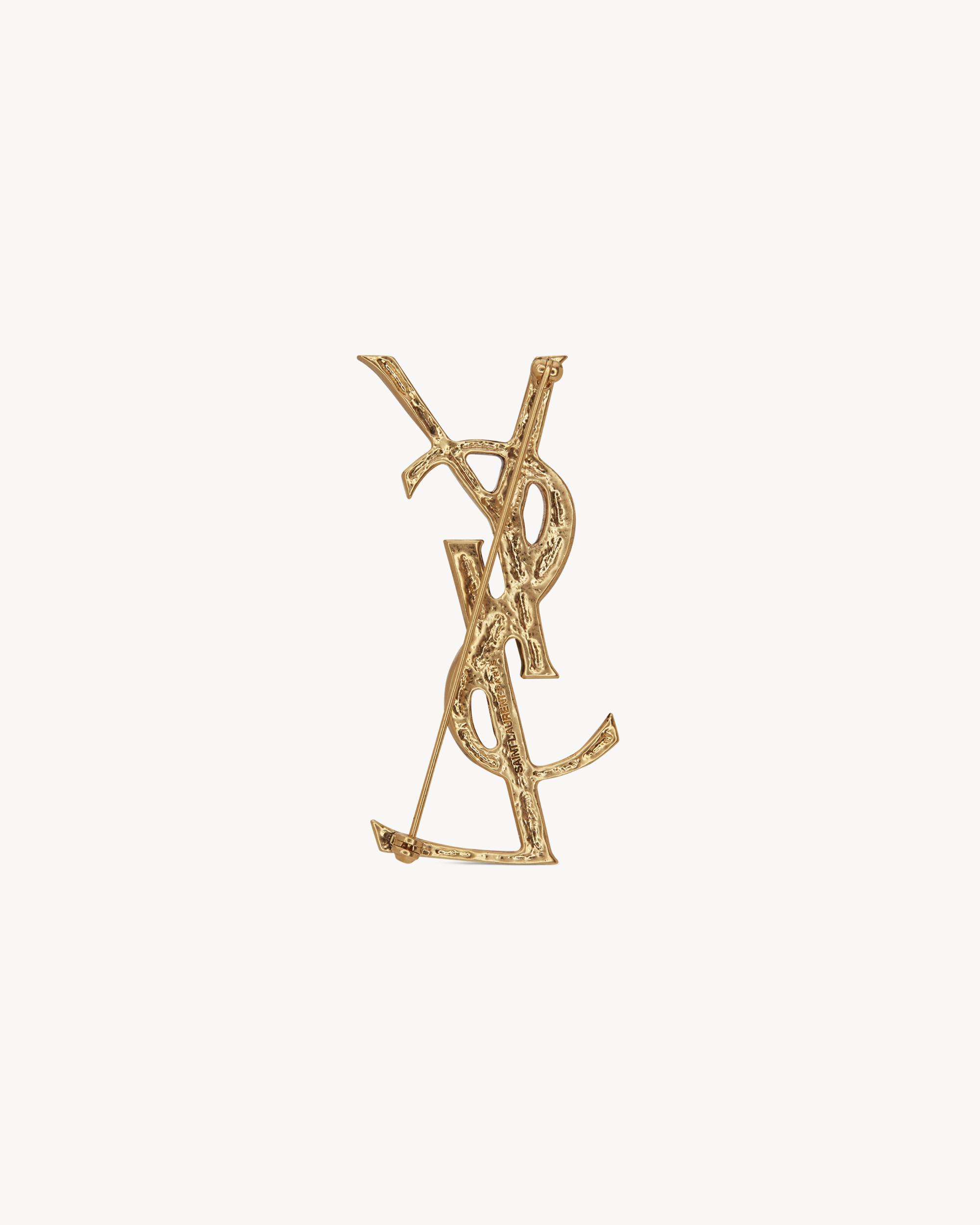 CASSANDRE crocodile brooch in metal Product Image