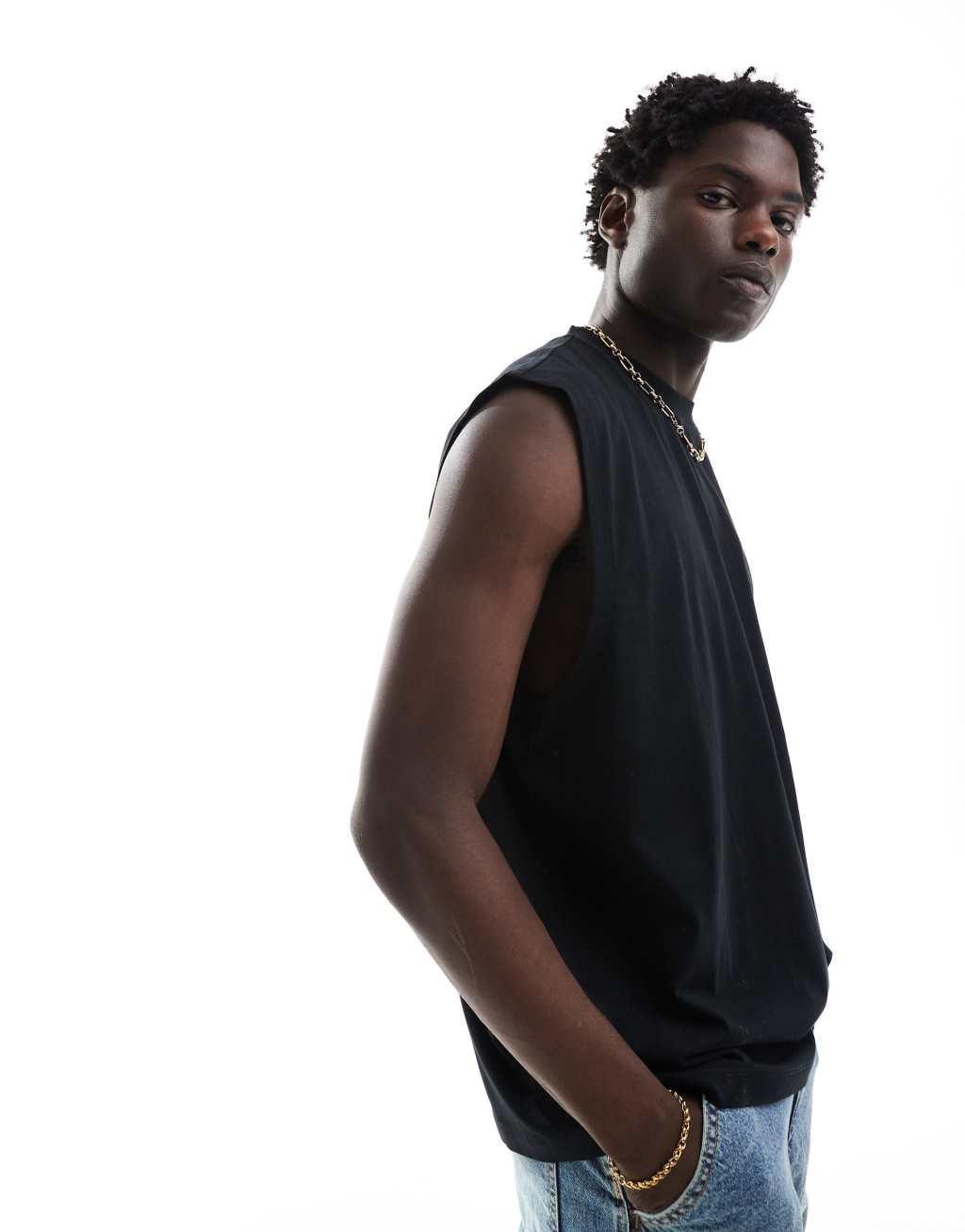 ASOS DESIGN oversized tank top in black with New York back print Product Image