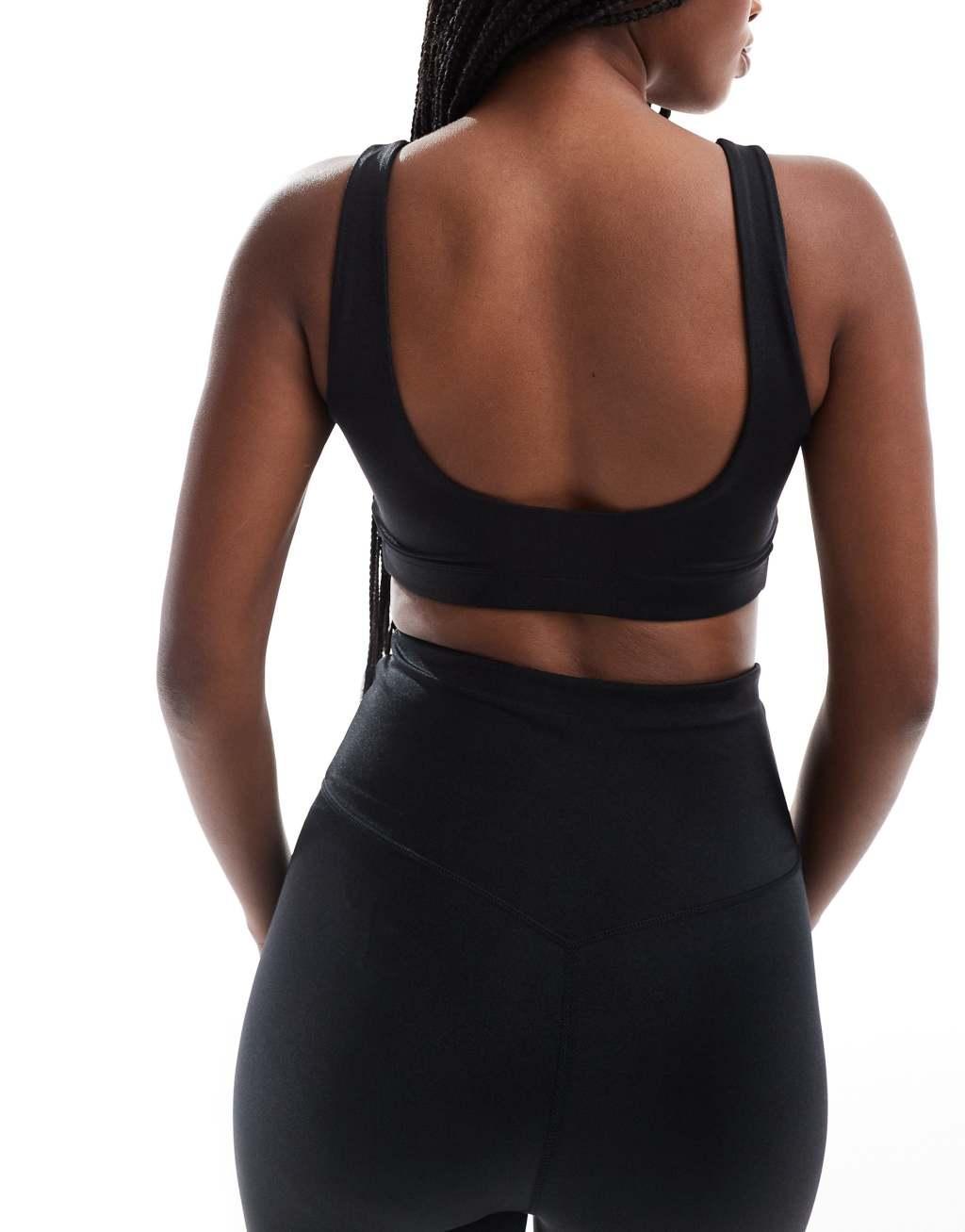4505 ruched front light support sports bra in high shine black  Product Image