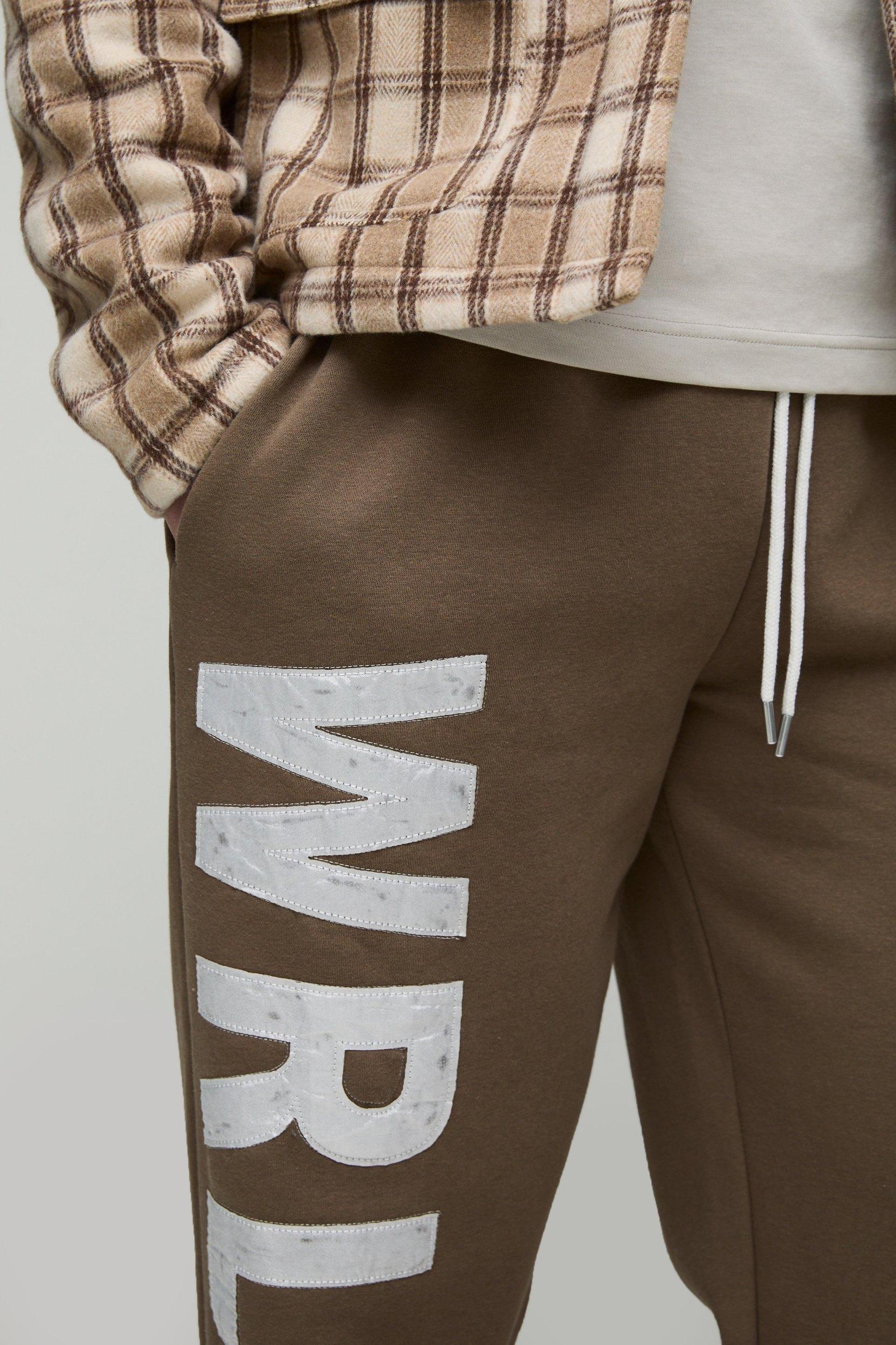 Tall Relaxed Satin Applique WRLDWD Sweatpants | boohooMAN USA Product Image