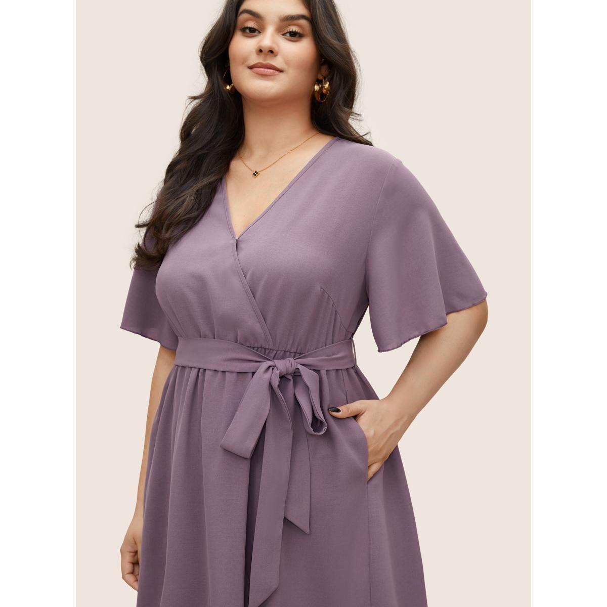 Plus Size Bloom Dress - Solid Tie Surplice Ruffle High Low Dress Plum Women Elegant Cross straps V-neck Short sleeve Curvy Midi Dress BloomChic 18/2X Product Image
