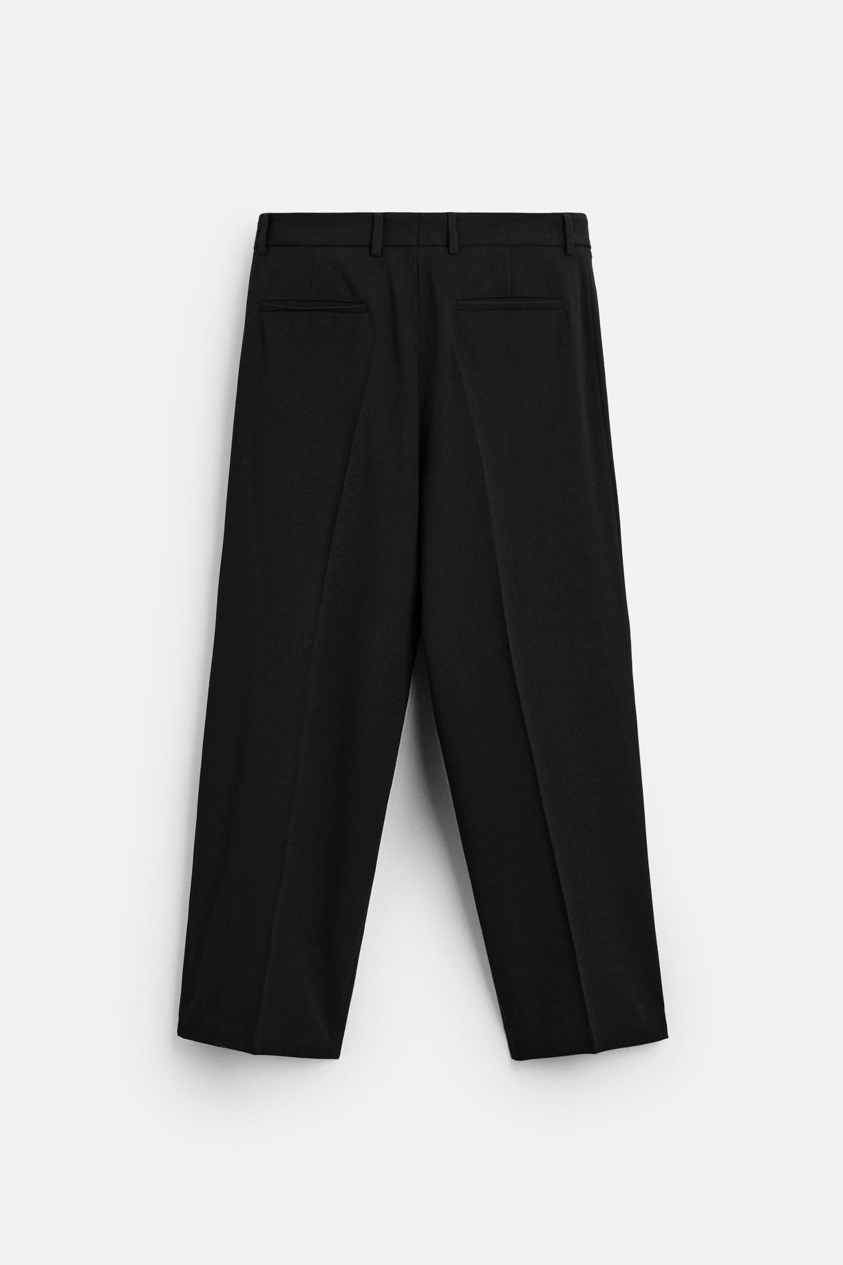 RELAXED FIT PLEATED PANTS Product Image